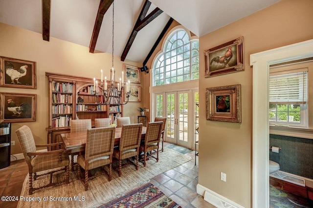 dining space featuring french doors, beamed ceiling, a chandelier, and high vaulted ceiling