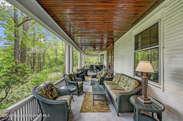 exterior space featuring ceiling fan and covered porch