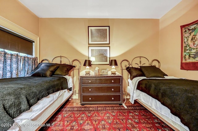 bedroom with hardwood / wood-style floors