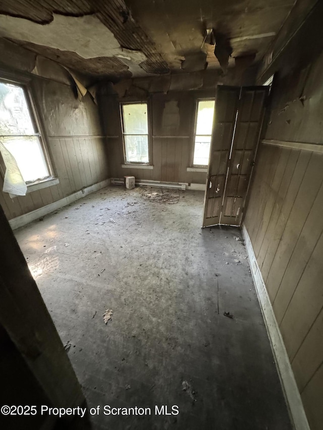41 William St, Hallstead, PA 18822 - unfurnished room with wood walls