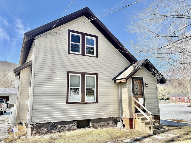 view of front of property featuring entry steps