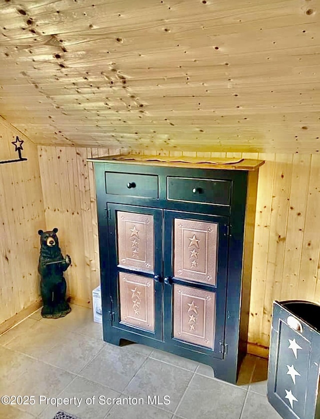 details with wooden ceiling and wood walls