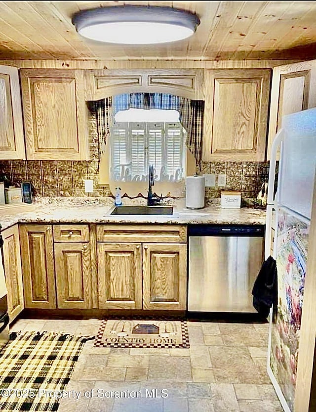 kitchen featuring tasteful backsplash, stainless steel dishwasher, freestanding refrigerator, wood ceiling, and a sink