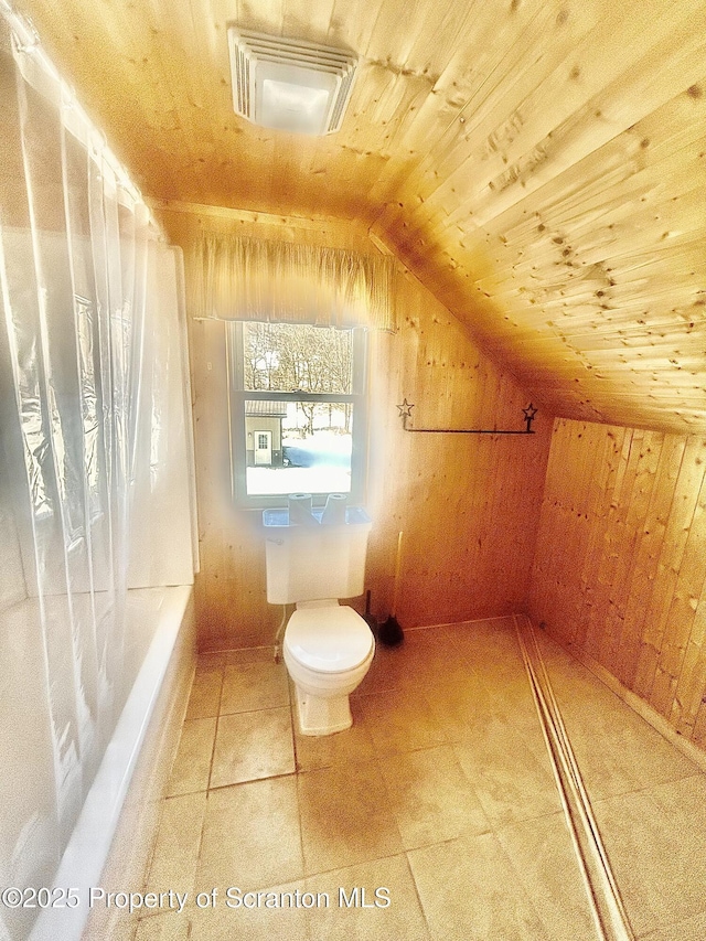 bathroom featuring visible vents, toilet, wood ceiling, vaulted ceiling, and wood walls