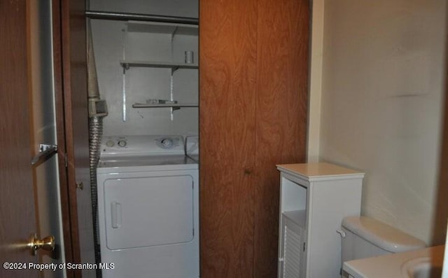 washroom featuring washer / clothes dryer