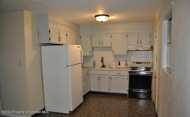 kitchen with backsplash, range with electric cooktop, sink, white refrigerator, and white cabinets