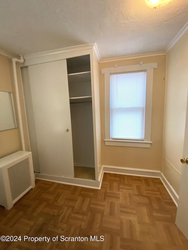 closet with radiator heating unit