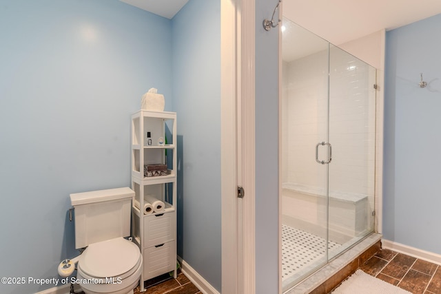 941 Old State Rd, Clarks Summit, PA 18411 - bathroom with a shower stall, toilet, and baseboards