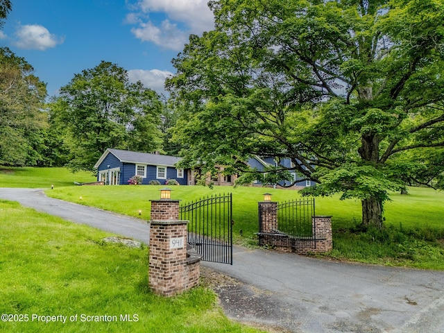 941 Old State Rd, Clarks Summit, PA 18411 - view of front facade with a front lawn and a gate