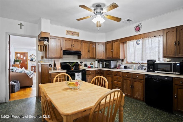 kitchen featuring sink, backsplash, ceiling fan, and black appliances