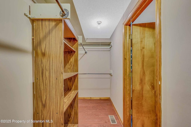 331 Drake St, Old Forge, PA 18518 - walk in closet featuring wood finished floors