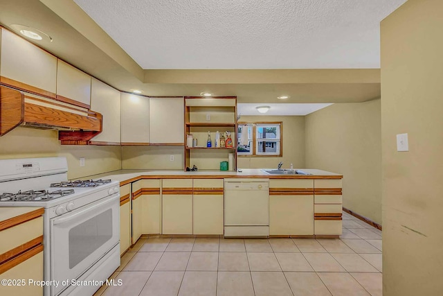 331 Drake St, Old Forge, PA 18518 - kitchen featuring white appliances, a sink, under cabinet range hood, light countertops, and a textured ceiling