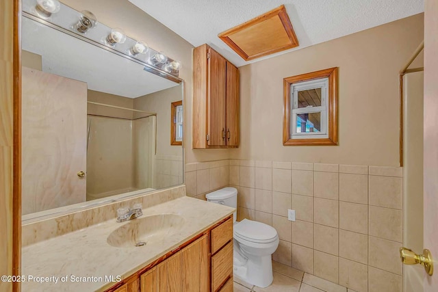 331 Drake St, Old Forge, PA 18518 - bathroom featuring tile patterned floors, toilet, vanity, tile walls, and a shower