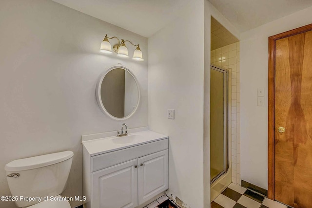 331 Drake St, Old Forge, PA 18518 - bathroom with vanity, a stall shower, toilet, and tile patterned floors