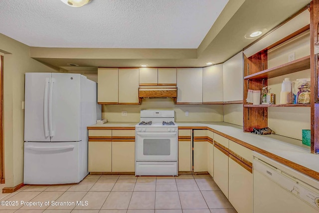 331 Drake St, Old Forge, PA 18518 - kitchen featuring white appliances, under cabinet range hood, light countertops, light tile patterned floors, and a textured ceiling