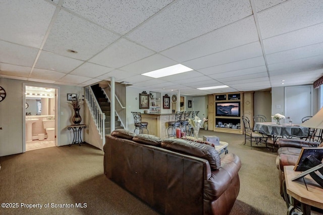 1130 Stafford Ave, Scranton, PA 18504 - living room featuring carpet floors, a paneled ceiling, and stairway