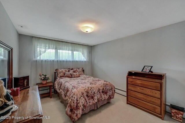 1130 Stafford Ave, Scranton, PA 18504 - bedroom featuring baseboard heating and carpet