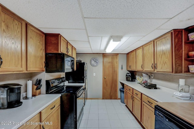 1130 Stafford Ave, Scranton, PA 18504 - kitchen with black appliances, open shelves, light countertops, a drop ceiling, and light tile patterned floors