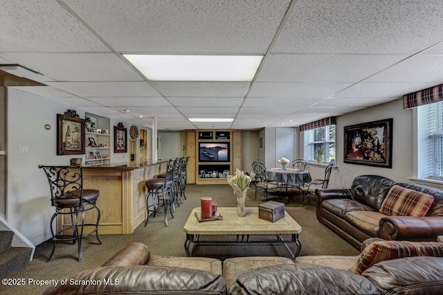 1130 Stafford Ave, Scranton, PA 18504 - living room featuring carpet floors, a dry bar, a drop ceiling, and plenty of natural light