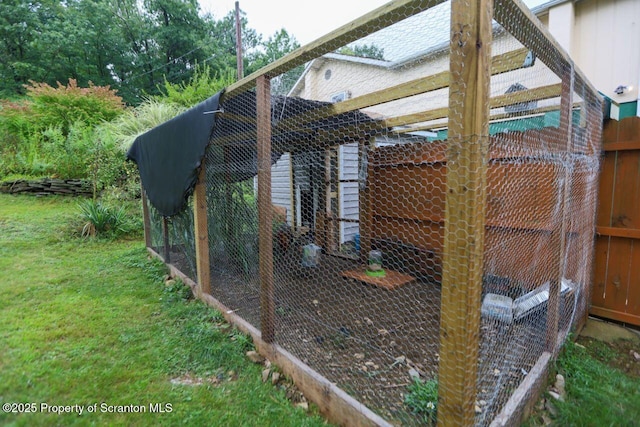 view of yard with an outbuilding and exterior structure