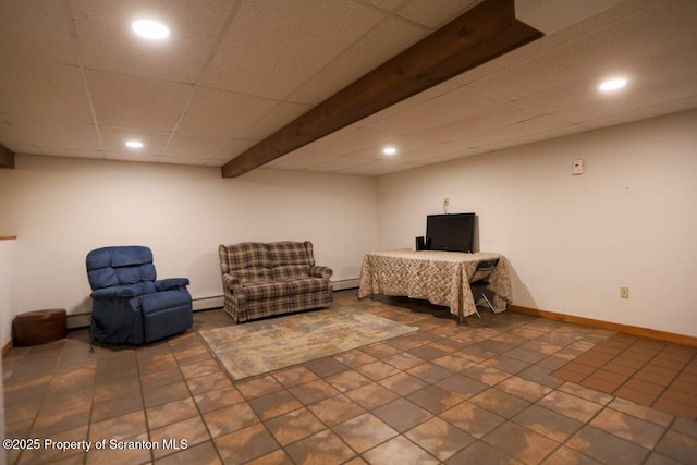 sitting room with recessed lighting, a baseboard radiator, and a paneled ceiling