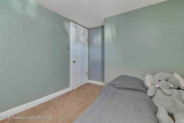 bedroom featuring carpet