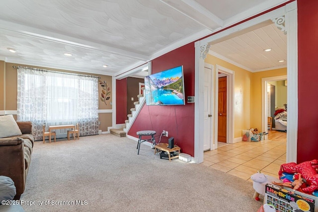 interior space with beamed ceiling, ornamental molding, and carpet floors