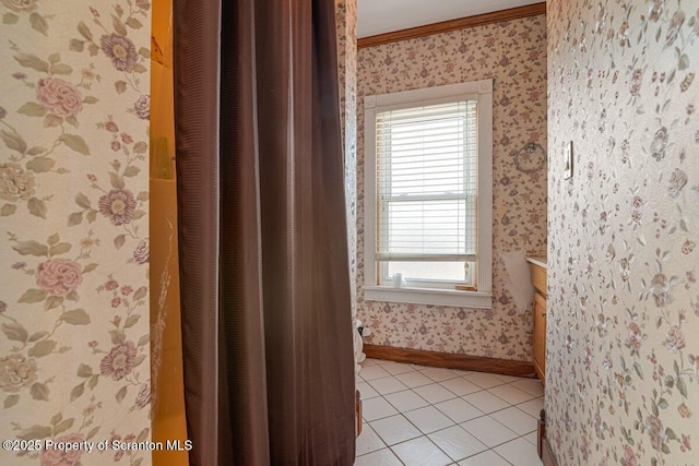 bathroom featuring tile patterned flooring and ornamental molding