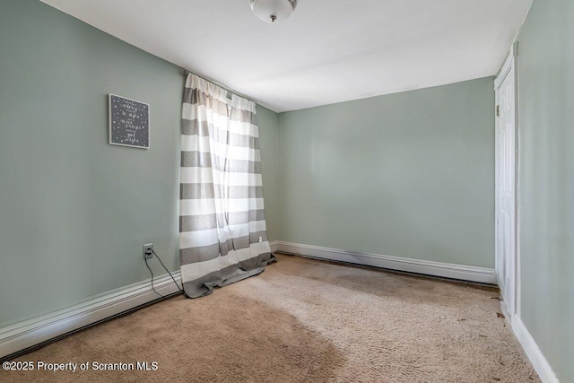 view of carpeted spare room