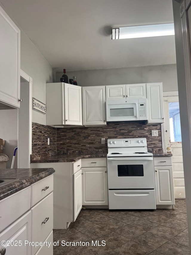 1010 Sterling St, Scranton, PA 18508 - kitchen with white appliances, white cabinetry, and decorative backsplash