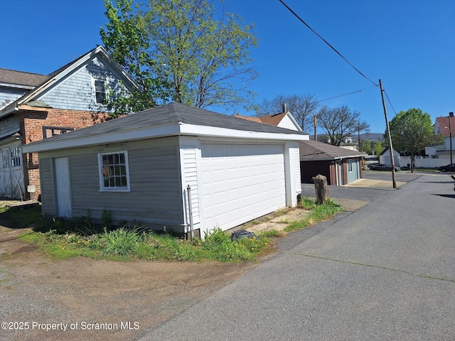 1010 Sterling St, Scranton, PA 18508 - view of property exterior featuring an outbuilding and a garage