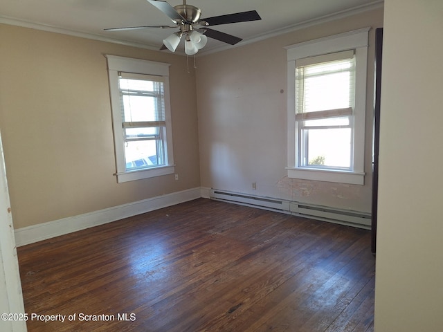 empty room with a baseboard heating unit, ceiling fan, dark wood finished floors, and ornamental molding
