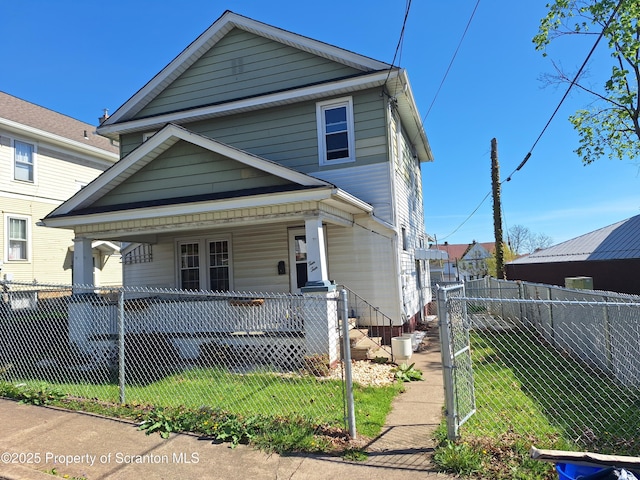 1010 Sterling St, Scranton, PA 18508 - view of front of property with covered porch and a fenced front yard