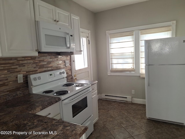 kitchen with plenty of natural light, decorative backsplash, baseboard heating, and white appliances