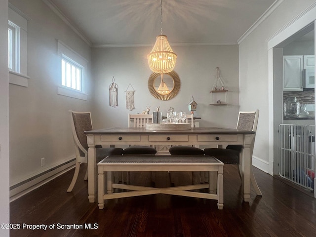 1010 Sterling St, Scranton, PA 18508 - dining space with ornamental molding, baseboard heating, wood finished floors, and a notable chandelier
