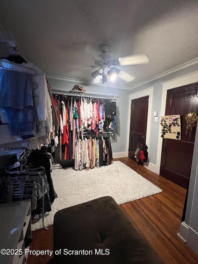 1010 Sterling St, Scranton, PA 18508 - bedroom featuring crown molding, a ceiling fan, baseboards, and wood finished floors