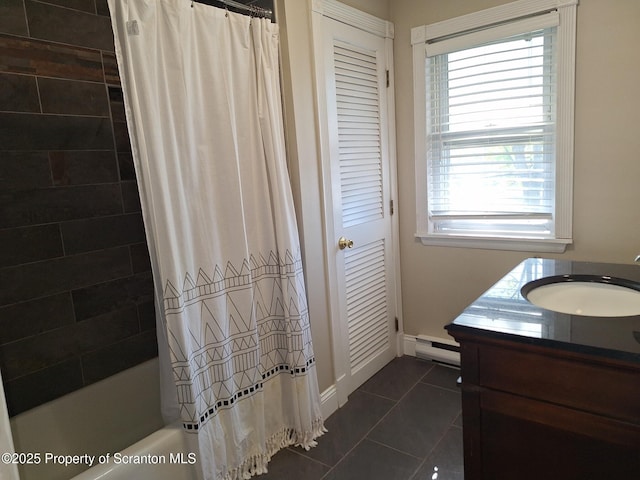 bathroom featuring shower / tub combo, tile patterned flooring, a baseboard heating unit, and a wealth of natural light