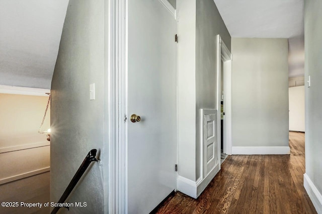 hallway featuring dark hardwood / wood-style floors