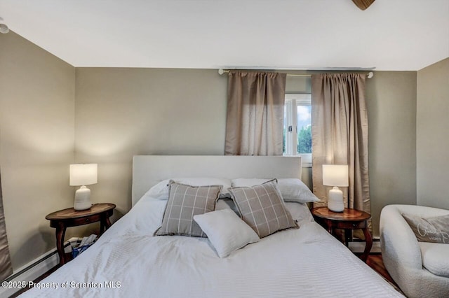 bedroom featuring a baseboard radiator