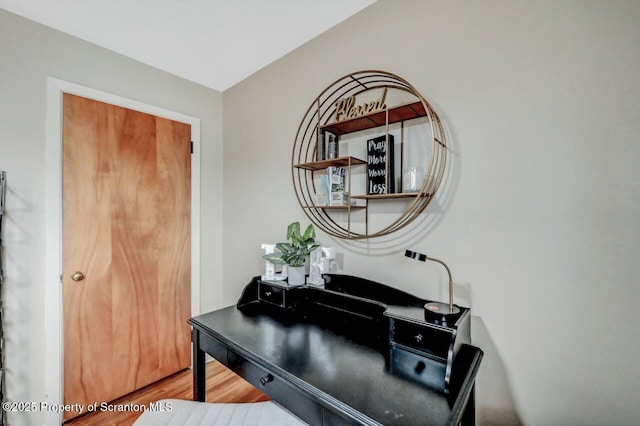 home office featuring wood finished floors