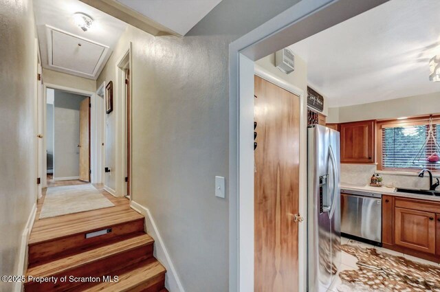 interior space featuring attic access