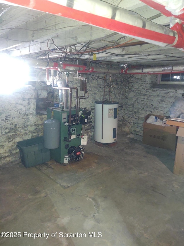 basement featuring electric water heater