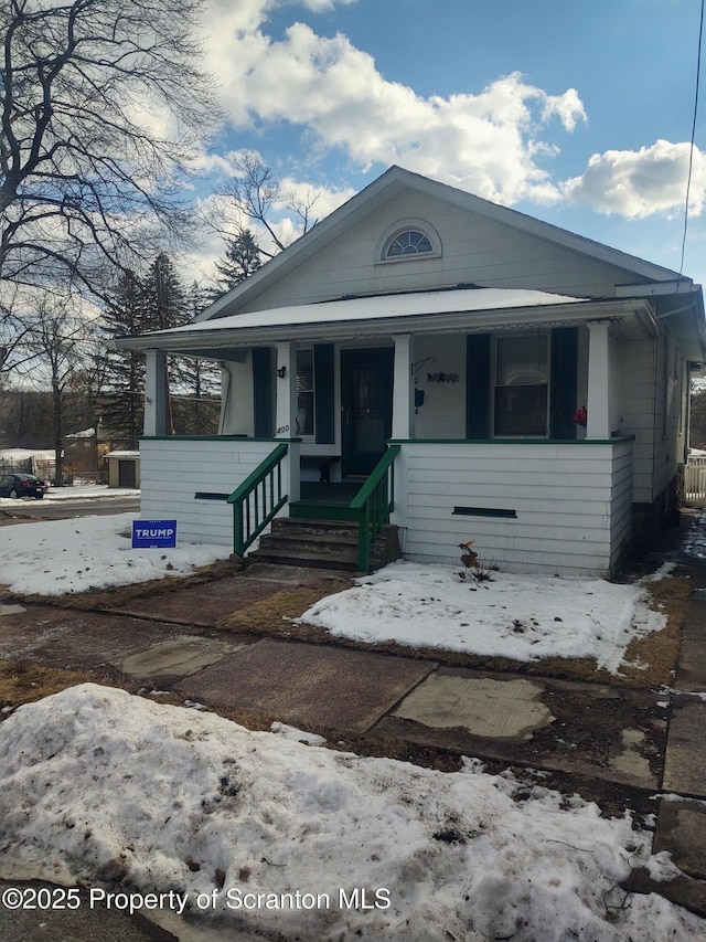 bungalow-style home with covered porch