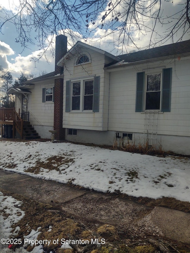 view of snow covered property