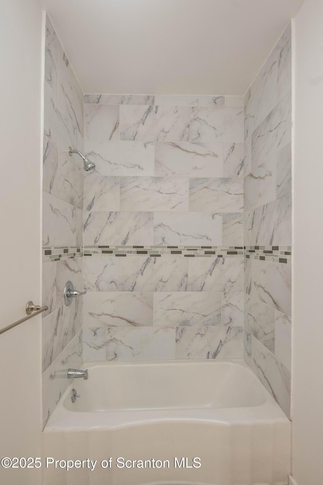 full bath with tub / shower combination