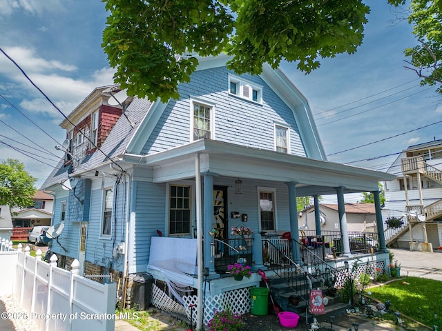 view of front of house featuring covered porch