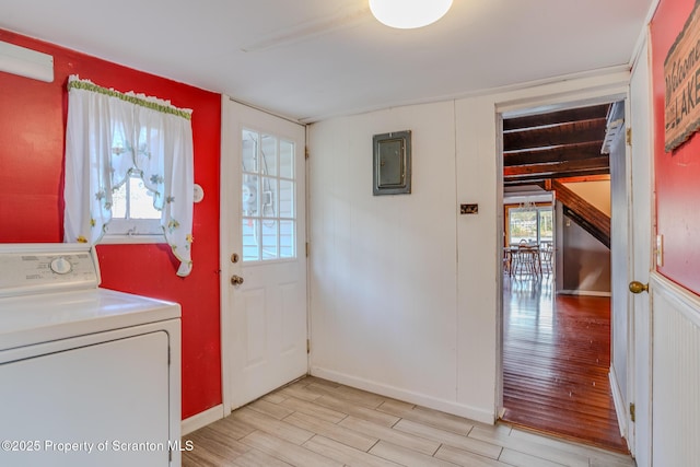 446 Lake Rd, Nicholson, PA 18446 - washroom with light wood-style floors, electric panel, laundry area, a healthy amount of sunlight, and washer / dryer