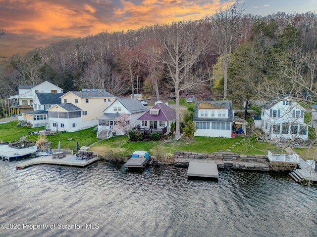 446 Lake Rd, Nicholson, PA 18446 - aerial view at dusk with a residential view and a water view