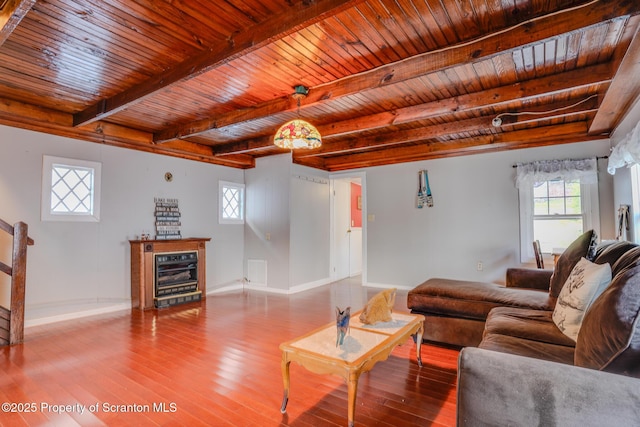 446 Lake Rd, Nicholson, PA 18446 - living room with beverage cooler, wood finished floors, wood ceiling, baseboards, and beam ceiling
