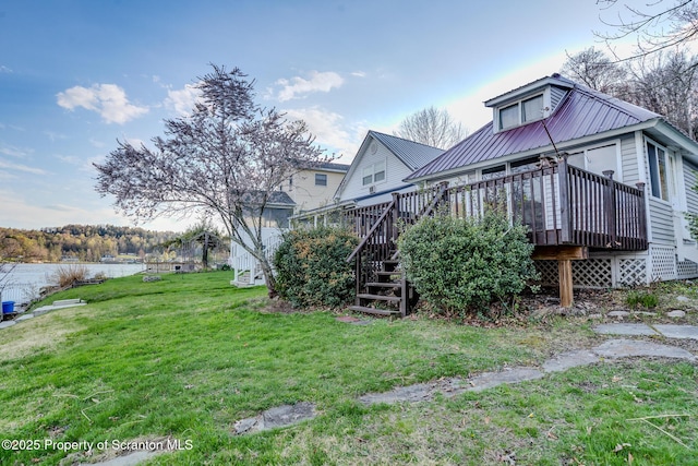 446 Lake Rd, Nicholson, PA 18446 - exterior space featuring stairway, metal roof, a yard, and a wooden deck
